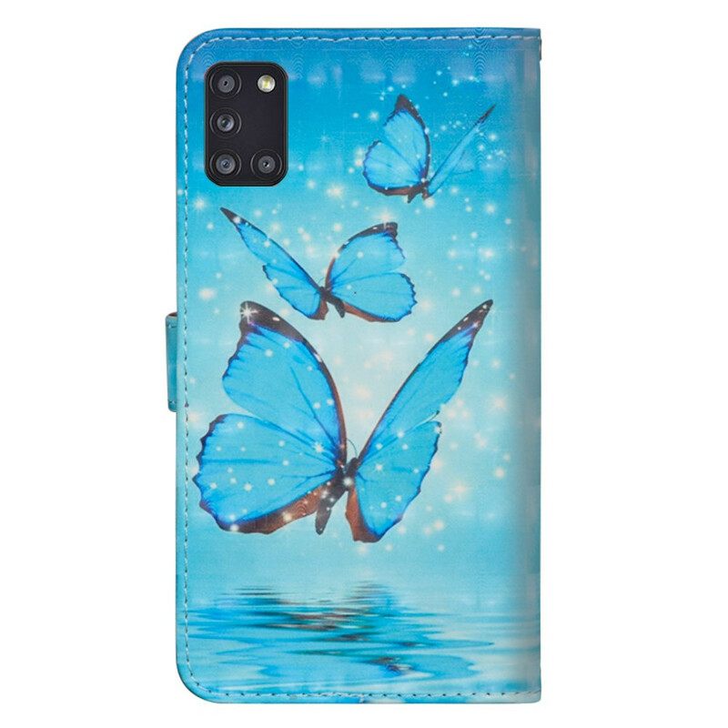 Nahkakotelo Samsung Galaxy A31 Flying Blue Butterflies