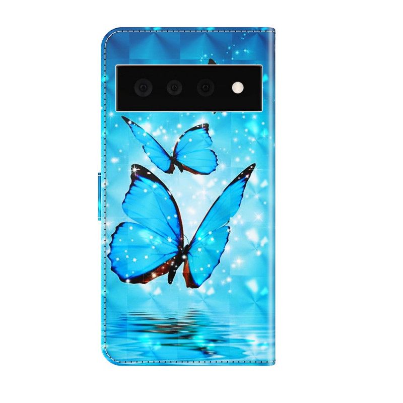 Kotelot Google Pixel 6 Pro Flying Blue Butterflies