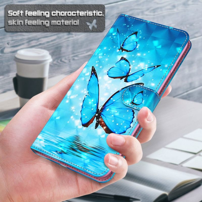 Kotelot Google Pixel 6 Pro Flying Blue Butterflies