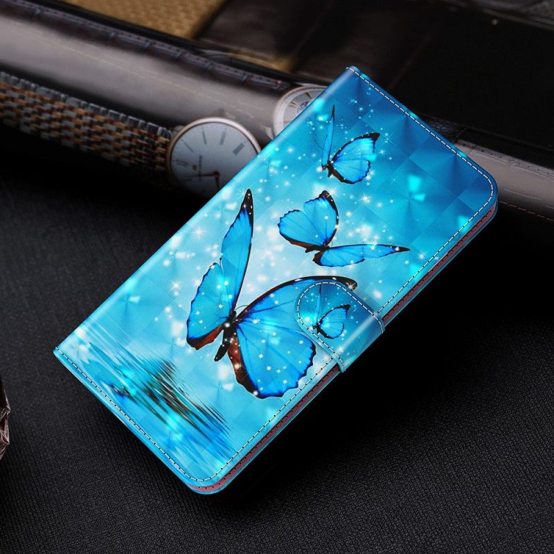 Kotelot Google Pixel 6 Pro Flying Blue Butterflies