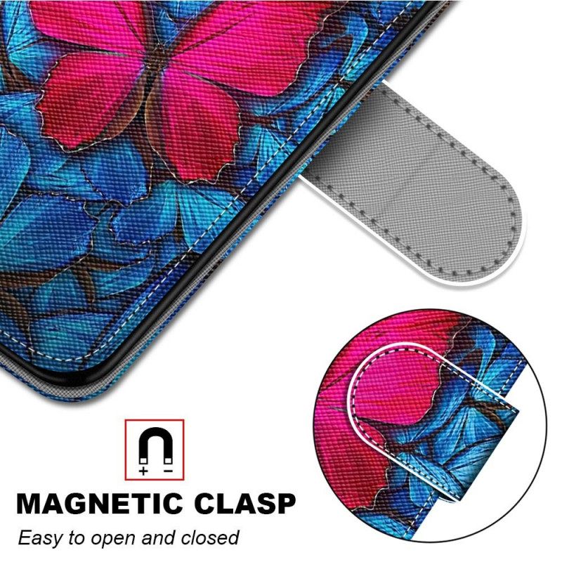 Flip Case Samsung Galaxy M23 5G Punainen Perhonen Sinisellä Taustalla