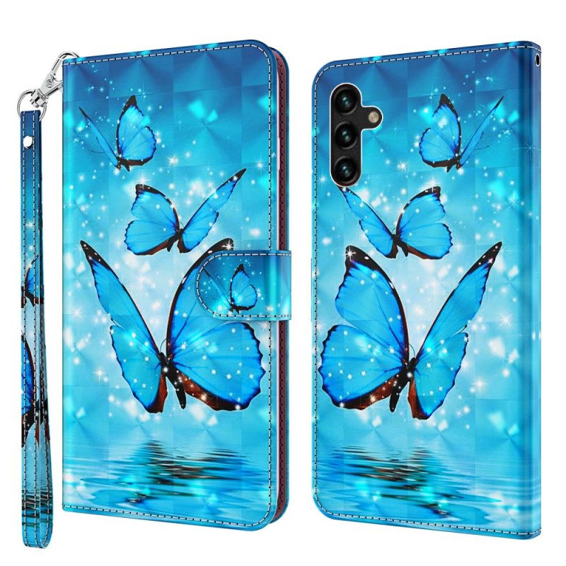 Nahkakotelo Samsung Galaxy A13 5G Flying Blue Butterflies