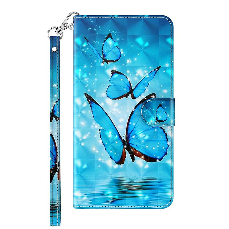 Kotelot Samsung Galaxy S21 FE Flying Blue Butterflies