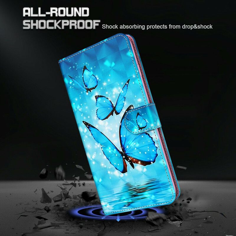 Kotelot Xiaomi Redmi 9T Flying Blue Butterflies