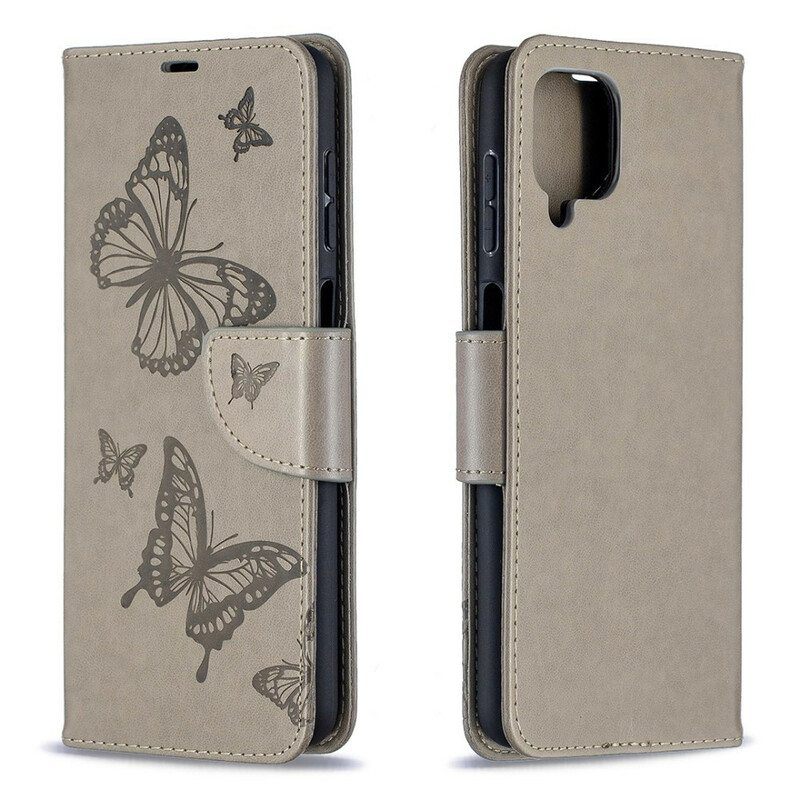 Flip Case Samsung Galaxy M12 / A12 Perhosia Lennossa Lanyardin Kanssa